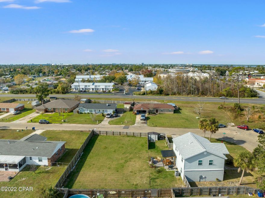 A must see vacant lot perfect for new construction in the quiet neighborhood of Meadowbrook Estates. Privacy fenced, cleared, established sod, on a paved road, public water and sewer available. In the heart of Panama City, this property is conveniently located to shopping, schools, and restaurants. If measurements deemed important, please verify.