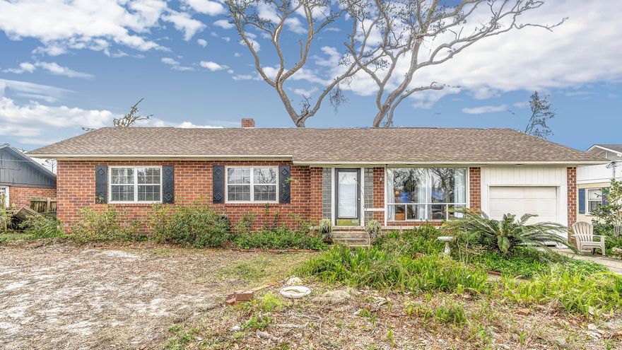 Cove charmer on an excellent street!  1605 Dewitt is an all brick 3 bedroom 1 bath home.  Inside the front door you'll find a sitting room with board and batten ceiling - an excellent place to unwind and relax. The living room, hall and bedrooms have beautifully restored hardwood floors.  The renovated kitchen opens to the living room and has stainless appliances, newer cabinets, fixtures, granite, and a pantry.  You will love the white subway tile back splash in the kitchen and cooking on the gas stove with convection oven.  There is a back porch off the kitchen which can be repaired to your liking after purchase.  The three bedrooms are down the hall and share the hallway bath.  There are two linen closets in the hallway and all bedrooms' closets are spacious. The bath has the original cast iron tub with a glass door, a newer vanity and bowl sink, white ceramic tiles and a pretty vintage black & white ceramic tile floor. All windows have been replaced with insulated two pane windows and the window treatments remain in the home. All the hardware on the doors has been replaced.  Some other improvements you can't see...all duct work has been replaced which makes a huge difference with air quality for this home!  The gas furnace and air conditioner have been carefully maintained by Pat Green Air.  The laundry area is in the one car garage; typical of a Cove classic.  There is attic access via pull down stairs in the bedroom hallway, partially floored. The minor roof damage will be repaired prior to closing.  Please call your Realtor today to catch this wonderfully updated home at a reasonable price!