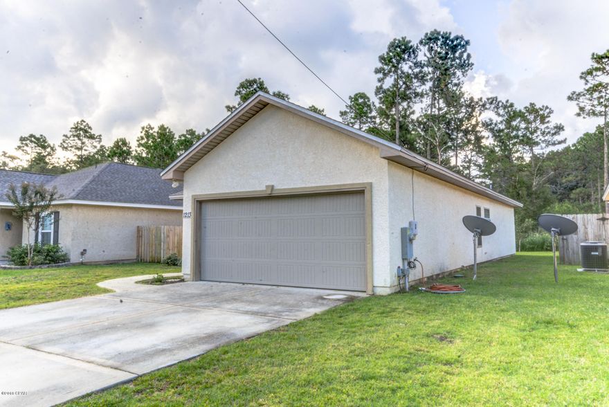 Well Built Don Miller home in very convenient location. Close to Tyndall AFB and town, NO flood insurance required!. Home has a few missing shingles and roof is taped after storm, one window was broken and is on order. When you first walk in to this 3 bed 2 bath home you will notice the high elegant ceilings, open spaces, durable Nafco brand flooring and plenty of natural light. In the kitchen you will find, stainless steel appliances, stone counter tops and custom cabinets. The master bedroom features a very large walk in closet, spacious master bath with large garden tub and standing shower. Outside you will find some fruit trees, lush grass and a lovely built in fire pit.