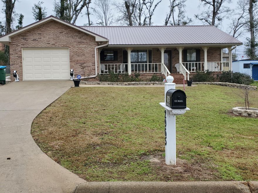 Beautiful Brick 3/2 Home with split Floor Plan in the heart of Marianna .  New Roof , trim, gutters and shutters.  New Garage door with automatic opener.  New privacy fence.  Newer stainless appliances 2018. This home has extra insulation and low maintenance.  Home has Handicap accessibility with automatic ramp if needed.  This home will be great for any family.
