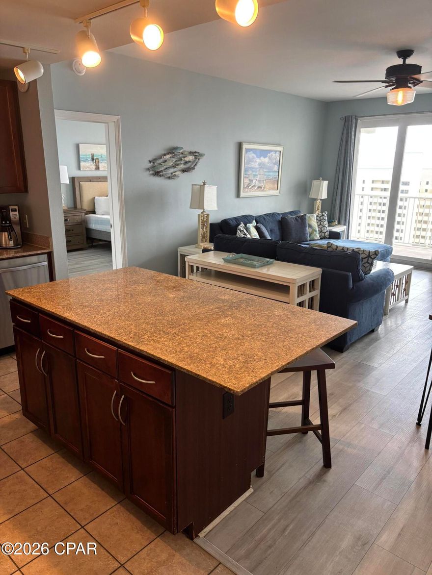 ***BEST PRICED 2 BEDROOM(WITH BUNK ROOM), 2 BATHROOM DIRECT GULF VIEW UNIT AS OF LIST DATE!!!***  The direct gulf front views from both the living room and master bedroom will take your breath away, and the 2nd bedroom lake views are spectacular as well. The additional dual bed bunk room guarantees maximum rental income by being able to sleep well over 8 guests at a time. This fully furnished unit offer stainless steel appliances, granite countertops, vinyl plank and tile flooring, and coastal inspired furniture and furnishings. The following are some of the Laketown Wharf amenities: Covered garage parking, 5 pools, 2 hot tubs, state of the art fitness center, private beach access, a boardwalk lined with 5 restaurants, a market shop, pool bar, and a nightly light show from the lake. This exquisite unit is priced to sell and will not last long...so call me before it slips through your fingers!! All information is approximate and should be verified by buyers if important.