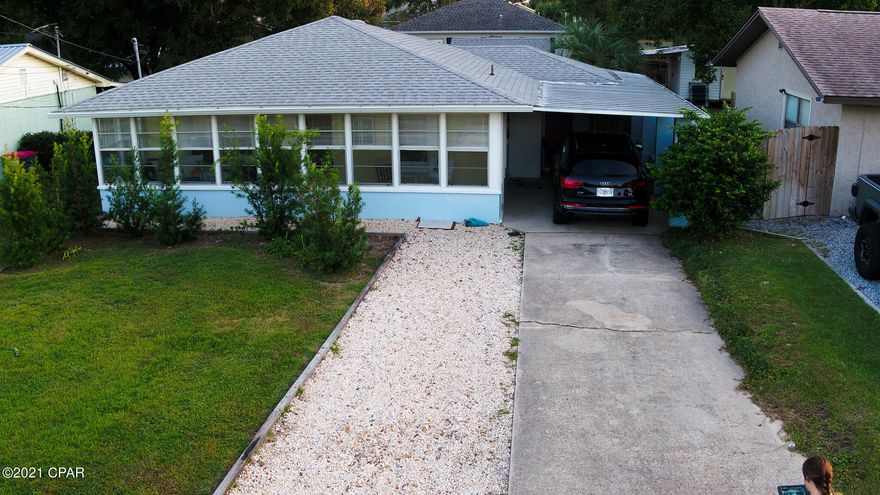Welcome to your new home! Just a short Golf Cart Ride from the beautiful sugar white sand beaches of the Gulf of Mexico sits this charming 2 bedroom, 1 bath vintage Florida Beach Cottage. Located in the highly desirable and family oriented neighborhood of Riviera Beach makes for an amazing family home or short-term rental. The fully fenced back yard features a BBQ area, an outdoor shower and a 12x15 concrete shed. The enclosed front porch is heated and cooled with windows all around making this Florida room a perfect place for lounging, dining or entertaining friends and family.  Updates include New outside HVAC in 2018, kitchen plumbing updated in 2020, new roof in 2016 and updated electric though-out in October 2021.  All sizes are approximate. Please have buyer verify if important. The square footage of the property is 1000+ (owner measured) This does not include the concrete shed in back yard that is also heated and cooledd.