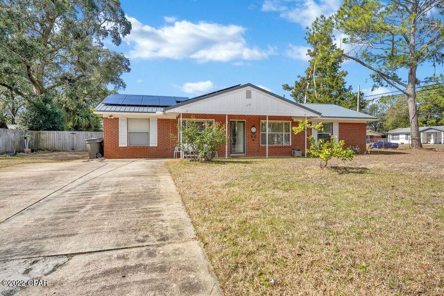 Spacious 2 bedroom, 2.5 bath, all brick remodeled home on a large corner lot. Large in-ground pool. Great neighborhood. Pool was done in 2019, solar was installed in 2020. Interior features tile, tile kitchen backsplash, and plenty of open floor space.