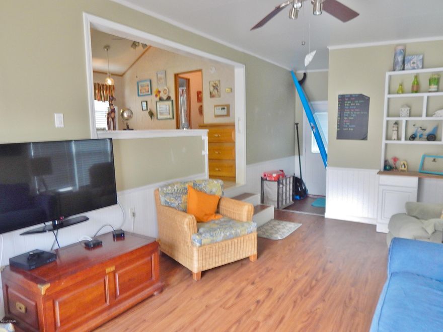 PRICE LOWERED - This is a very clean & well kept unit in a gated subdivision less than a mile from the Beach. Emerald Pointe Resort is a unique community offering a club house, pool, pond, and beautifully landscaping. The 2 BR / 2 Bath unit is laid out very smartly with a split bedroom floor plan & high vaulted  ceilings in the living area & bedrooms.