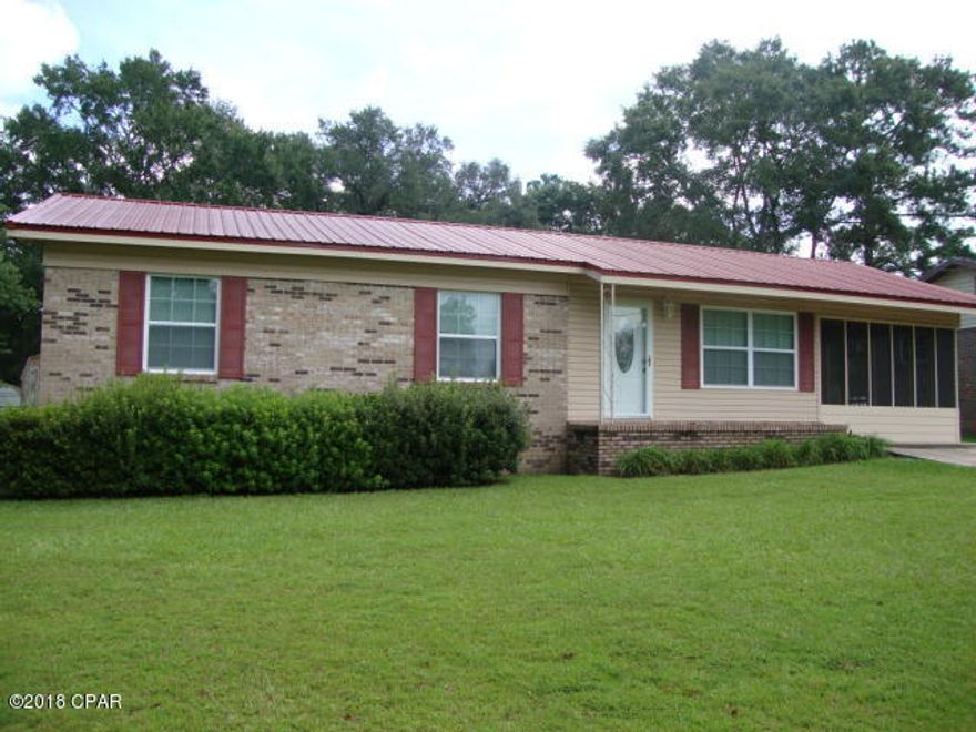 Nice Updated and Remodeled 3 Bedroom 1 Bath Brick home on lot in the town of Bonifay. All newer Low-E windows. Nice decorative door on the front and back door that has blinds built in. Remodeled living room, dining room and kitchen gives an open concept and includes a spacious pantry. Custom cabinets with self closing drawers, newer countertops and mosaic back splash.  Laminate floor covering in living room, hallway and bedrooms. Newer ceiling fans and light fixtures throughout. Nice size screened porch with ceiling fan. Oversized laundry room.  Metal Roof. Fenced back yard. Cute barn style storage building. Frontage on nice and quiet paved street in walking distance to the grocery store. This is a have to see to appreciate.