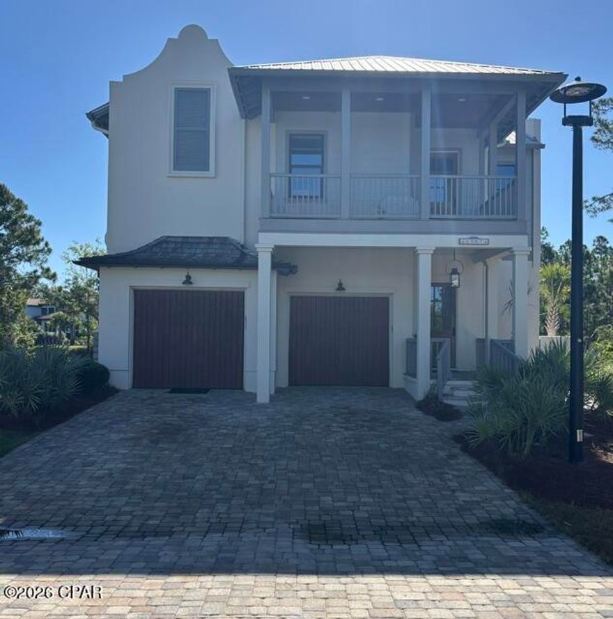 ***3 BEDROOM(WITH HOME OFFICE), 2.5 BATHROOM STUNNING HOME IN THE EXCLUSIVE(AND GATED) MARTINIQUE COMMUNITY!!!*** This absolutely breathtaking 6 year old home has been meticulously maintained by its owners. Exterior features include but are not limited to: Metal roof with cedar shake accents, a brick pavers driveway, first floor stucco walls with stucco parapets and second floor hardie board siding, custom cypress wood garage door, tankless gas water heater, wood deck, tongue and groove front porch ceiling with pecky cypress and tile floors. The screened porch is absolutely beautiful and perfect for relaxing in, and to top it ALL of a $55,000 backyard renovation finalized in 2024 that includes a stucco concrete wall, brick pavers, wood gates and artificial turf. As you step inside the home you are greeted to an open floor concept that offers crown molding, ceiling fans throughout the home and bedrooms, a wood look tile throughout the first floor, wood stairway, spacious loft, second floor luxury vinyl plank flooring, tiled master bathroom with a marble band and marble shower floor, marble tiled guest and half bathrooms and custom closets in all rooms. The living room shell stucco gas fireplace(with a gas ventless insert)is an added touch, perfect for those cool winter nights. Kitchen comes with stainless steel appliances, a gas range, custom pantry, shaker style cabinetry, quartz countertops(throughout home), and a marble backsplash. Spray foam insulation and impact resistant windows throughout. This home will not last long...so call me before it gets away! All information is approximate and should be verified by buyers if important.