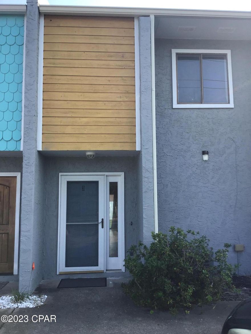 CURRENTLY UNDER CONTRACT, SELLER WILL CONSIDER BACKUP OFFERS
'LOCATION IS THE KEY!  one of the best prices you will find on the beach and a short block (100 yds!) to the water! This townhome is south of Thomas Dr at beach access 20! A glistening pool just steps from your back door! Downstairs you will find a large living room & dining area with a storage closet indoors!  Nicely appointed kitchen and the laundry room just off the kitchen there is a half bath for guests on the main level. Sliding glass doors open from the living room to a sitting area just steps from the community pool.  Upstairs you will find a very large master bedroom with ample closet space. the second bedroom is large enough for a king bed and has a walk in closet. the shared bath is a good size with a tub shower combo.  This is a perfect way to have a home or second home near the water without paying a fortune or having to depend on rentals.  Come see this one and own your own piece of Panama City Beach!!  sorry no short term rentals allowed.