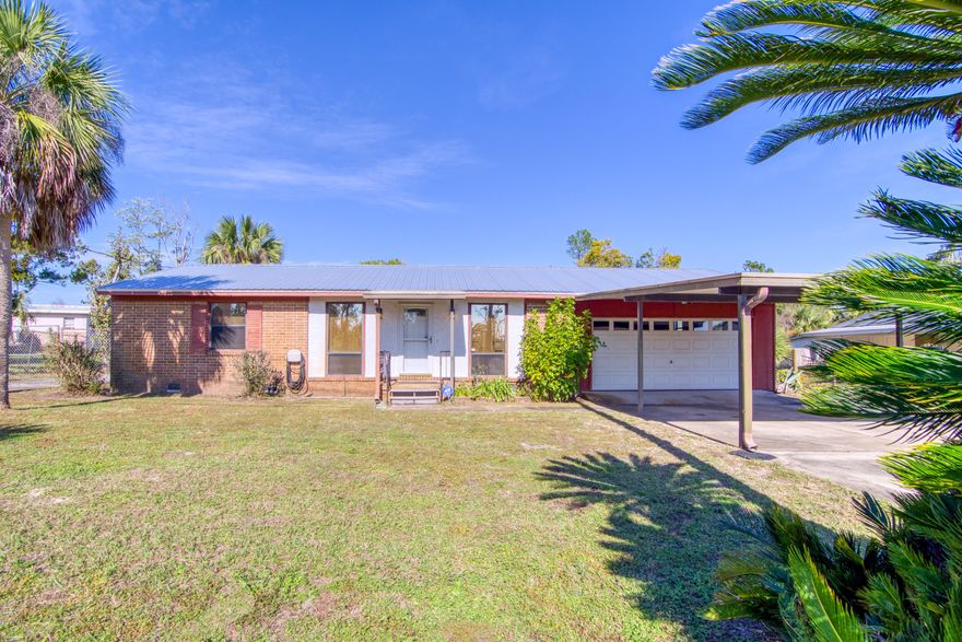 ***HAVE RECEIVED MULTIPLE OFFERS. CONTINUING TO SHOW THROUGH TUESDAY. SUBMIT HIGHEST AND BEST BY 1.07.2020 at 7 PM*** This is a TERRIFIC chance to own a move-in ready 4 BR, 2 BA home in a quiet, neighborhood on the edge of St. Andrews at a FANTASTIC PRICE! New metal roof in 2019 from a reputable local contractor; only needs minor interior cosmetic work.  Baths have been updated over time. Bamboo flooring throughout.  Layout is a split plan: 3 BR/1 BA in the front half of the house and a 1 BR/1 BA master suite in the back for max privacy. The central kitchen, which is open to the front living area and large back den with a lovely fireplace, awaits your personalization as the heart of your new home. All appliances present in the home DO convey. Yard has private well and sprinkler system.