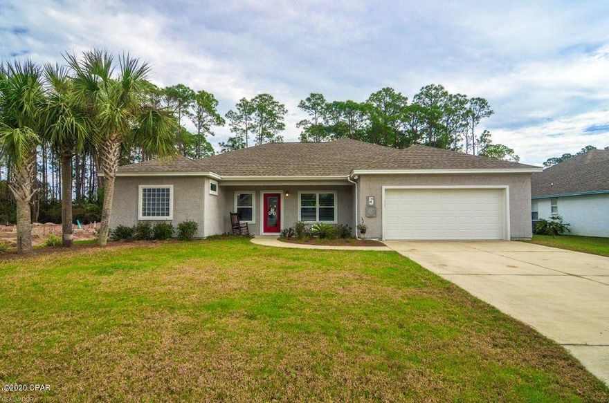 'CURRENTLY UNDER CONTRACT, SELLER ACCEPTING BACKUP OFFERS'Home was temp off market.  Great opportunity to own in the desirable Jamaican Lakes gated community on the quiet West-end of PCB.  Spacious 4 bedroom 2 bath has a large open living, kitchen and dining area.  Currently used one bedroom as an office. Large bedrooms, nice bathrooms, screen enclosed patio, separate laundry, two car garage and provides much more than most needs.  This large lot offers room for a future pool if desired.  House will need some minor repairs to meet lender requirements.  Approximately 30'' strip of drywall on the walls will need replaced, carpet in bedrooms & a portion of Livingroom flooring has been damage by water leak.  see last 2 pics other Photos of home prior to the current owners occupancy in 2017.  A