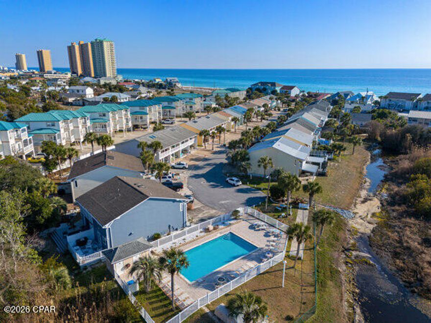 BRING AN OFFER! END UNIT! Come see this in person!!
Discover your dream getaway at this stunning end-unit condo in beautiful Panama City Beach! With 2 huge bedrooms, a newly remodeled interior, and a huge back porch perfect for soaking up the sun, this fully furnished gem is ready for you to move in. Enjoy the community pool and envision the rental potential if you choose to share this paradise. 50K IN RENTAL POTENTIAL! WOW! Ask for A CASH FLOW SHEET! Don't miss out on this opportunity! Call TODAY for a showing! EASY SHOW!