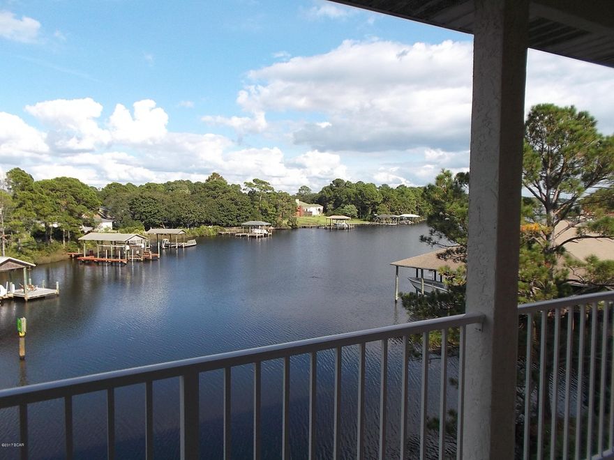 Waterfront condo on N. Lagoon. Third floor unit with open floor plan, raised ceilings, breakfast bar, split bedrooms with large built in closets, french doors off 2nd bedroom onto the balcony over looking the water, washer/dryer connections. End unit. Community pool, located in cul-de-sac. Water, sewer, trash included in rent.