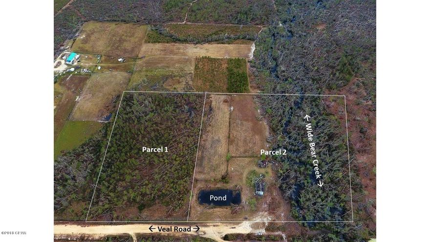 12427 Veal Road, 14 Peaceful Acres of Tranquility. Large and private at the end of Veal Road. A small 2/1 home on the property that could be restored or used as storage or taken away if desired. Many uses, build a dream house, horses, a farm, possibly a venue for weddings and events. The property is 19 miles North of the Panama City Mall, 10 miles from Hwy 20, 34 miles from Boon Docks @ Hwy 79. Survey available, view the aerial photos of property, Come visit today!