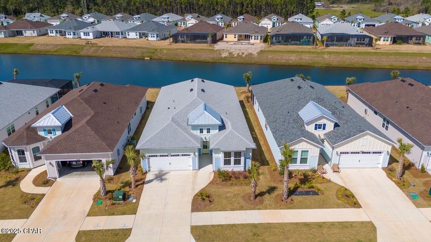 BACK ON MARKET AT NO FAULT TO THE SELLERS!!!  Beautiful Pond View and Priced to Sell!  Welcome to the laid-back lifestyle inspired by the late Jimmy Buffet and his Margaritaville brand!  Latitude Margaritaville is a 55+ community located only 7 miles from the World's most beautiful beaches!  

9526 is a brand new, never lived in, 3 bed, 3 bath dream home with a total of 2394 square feet.  Once you enter through the front door, you notice soaring ceiling heights in the foyer and entry hallway.  At the front of the home, you have 2 guest bedrooms, a den/office, the full bathroom, and a half bath.  As you proceed into the great room, you can't help but notice the water views through the large 4 panel sliding glass door that opens over 10' for the best of indoor/outdoor living.  The great room has nice tall, vaulted ceilings, and plenty of room for the oversized sectional sofa!  The kitchen has upgraded soft close cabinets and drawers with a built-in oven, quartz counters, glass cooktop, and an undermount sink in the enormous island!  The huge master bedroom has a large bay window, and his and hers closets!  The master bath has a gorgeous tile walk in shower, and double sinks, completed with quartz to match the kitchen and other bath.  The large, covered patio out back has plenty of room for you to add an outdoor kitchen, hot tub, lanai, pool, or anything else you can think to transform the backyard living into your own...all while having the soothing views of the pond.

The Latitude Margaritaville Town Square offers residents all they could ever need, from the Paradise Pool to the Indecision Kayak Launch, and everything in between. The Barkaritaville Dog Park, Fins Up Fitness Center, Community Service Building, bocce ball courts, outdoor lawn games and park, picnic areas, tennis courts, pickle ball courts, the Town Square Amphitheater, and the Latitude Bar and Chill restaurant!

Located only minutes away from the soon to come West Bay shopping center and the Town Square amenities, only 7 miles to the sand, less than 15 minutes to the airport, and only 10 minutes from the new Tallahassee Memorial Healthcare facility, Latitude Margaritaville really does have it all!  Don't wait to see this one in person and start living the laid-back Margaritaville lifestyle you deserve!  Take a look, fall in love, make an offer.  MOTIVATED SELLER, and ready to negotiate!!!