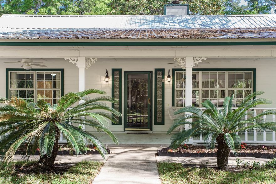 Move In Ready, Super Clean, Seller Offering $5,000 towards Buyers Closing Cost! This Charming  Farmhouse style home is located on a large almost .75 Acre Water View of Deer Point Lake Lot with beautiful oak trees & a circular driveway. NO FLOOD INSURANCE REQUIRED- NO HOA FEE's Metal roof, central air/heat unit new within past 5 years, New water system 2014. Private Well with Water Treatment System & Septic System, No more water & Sewer Bills! Open Split bedroom Plan. In the living room there is a high vaulted ceiling & beautiful stone fireplace.The Kitchen & Dining Area are very Large, Solid Wood Cabinetry & New Quartz Silestone counter tops installed Jan. 2018 & beautiful ceramic tile. The Master Suite is spacious 13x17 & has walk In Closet & master bath with deep garden tub & spacious separate shower with glass shower door. The Laundry room is spacious & has a deep sink. This home has wonderful outdoor space: 500 sq ft covered front porch with swing. Back yard is fully fenced with deer point lake water view, large storage shed & potting shed. The Garage is Oversized with plenty of storage space. There is so much to love about this home! Located on paved street with good lighting, near 2 boat ramps & closely set between two speed bumps, and located in the Deerpoint, Merritt Brown, Mosley School Zones. Cable & High Speed Internet Available. Current Up to Date Transferable Termite Bond Included! Make your appointment to see this beautiful home TODAY! All Measurements Approximate, please verify if needed.