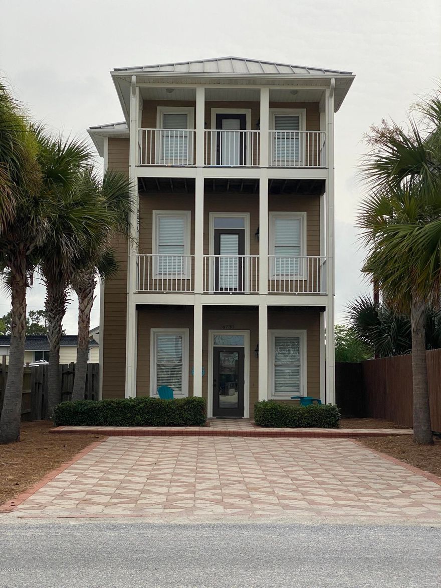 Newly renovated three story beach house located just off Thomas Drive. First floor offers a living area and a beautifully designed and kitchen with granite counter tops and new stainless steel appliances. There is a first floor bedroom with ensuite. Second floor offers two additional bedrooms both with its own ensuite. On the third floor you can enjoy a look out lounge with wet bar and a balcony with views of the gulf. Covered large porches and balconies on all levels. This would make a great home or vacation rental.