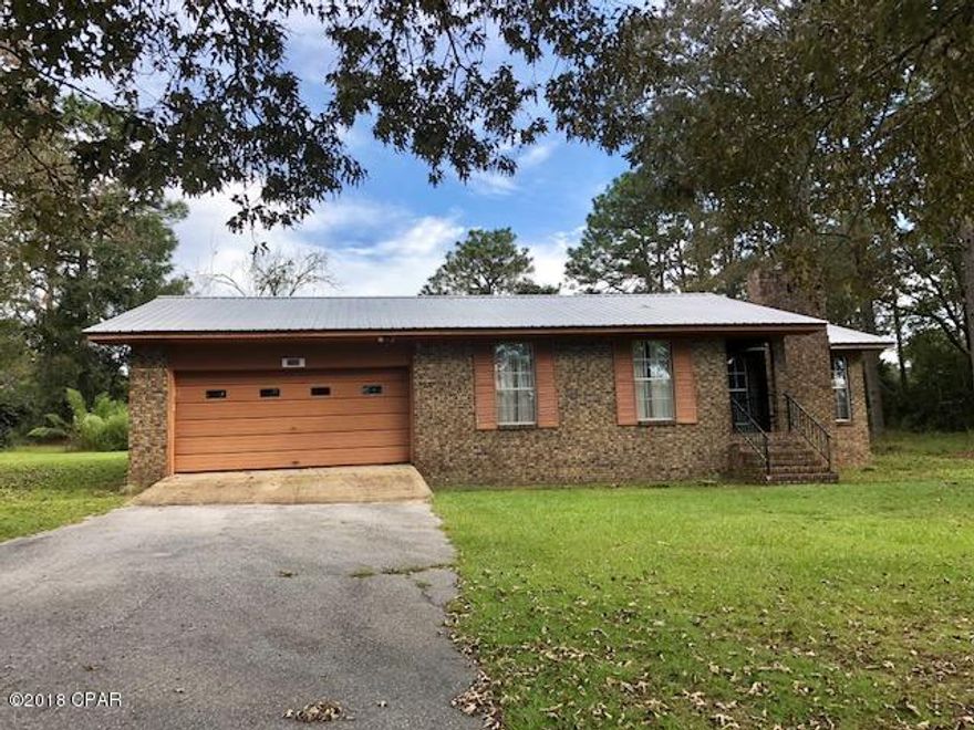 PRICE REDUCED!!          Adorable home at Dogwood Lakes near/on the golf course.  This home features 3 bedrooms and 2 baths, living room with fireplace and an attached 2 car garage.  The location is perfect for golfing, bird watching and enjoying this neat neighborhood.  It is only minutes to Bonifay for shopping.