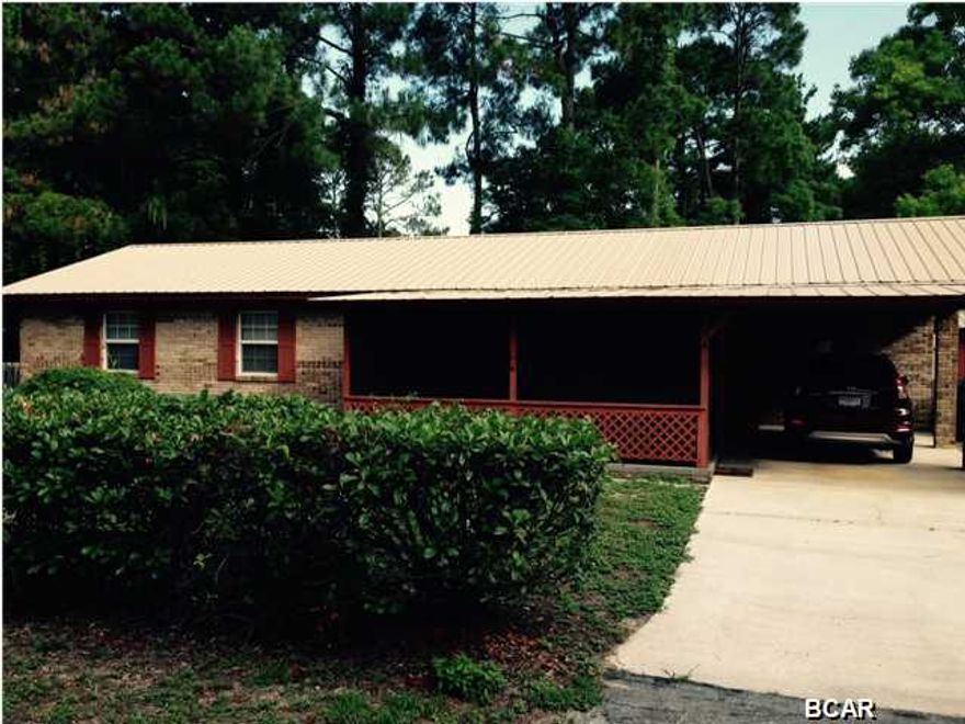 PRICED BELOW CURRENT APPRAISAL!!! APPRAISAL ON FILE <> THIS IS A WELL PRICED MUST SEE HOME <> THE QUINTESSENTIAL ''BRICK HOUSE'' WITH A METAL ROOF! THIS WELL KEPT, WELL PRICED HOME SHOWS PRIDE OF OWNERSHIP THROUGHOUT <> IN A VERY QUIET NEIGHBORHOOD WITH QUICK ACCESS TO 23RD ST AND THE BEACH <> THIS HOME IS ALMOST ON CAMPUS AS IT IS VERY CLOSE (WALKING DISTANCE) TO GULF COAST STATE COLLEGE AND FSU <> THE HOME IS IN GREAT SHAPE AND FEATURES A LARGE FENCED IN YARD AND AN OUTBUILDING FOR YOUR CONVENIENCE ROOFED TO MATCH THE HOUSE <> THERE IS A LARGE LAUnDRY / PANTRY ROOM RIGHT OFF THE KITCHEN AND VERY ENJOYABLE SCREENED-IN FRONT PORCH AND COVERED PATIO <> I ALSO LIKED THE DOOR LEADING FROM THE MASTER BATH TO THE BACK YARD FOR EASY ''WASH-UP'' WHILE WORKING IN THE YARD.