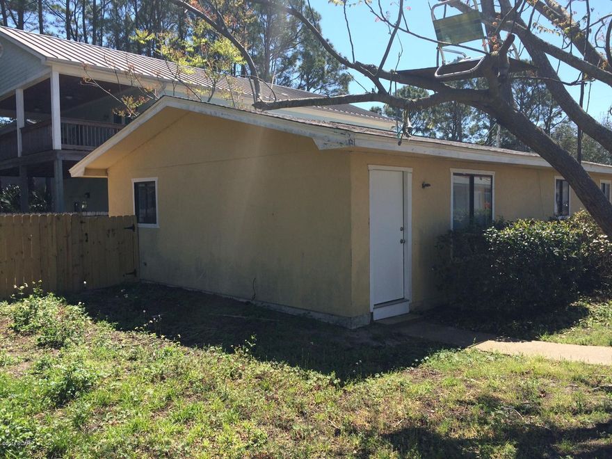 Two bedroom one bath duplex apartment located in the South Lagoon, and only a few blocks from the beach.  New paint on the interior, and a large concrete patio out back. Laundry room with extra storage.