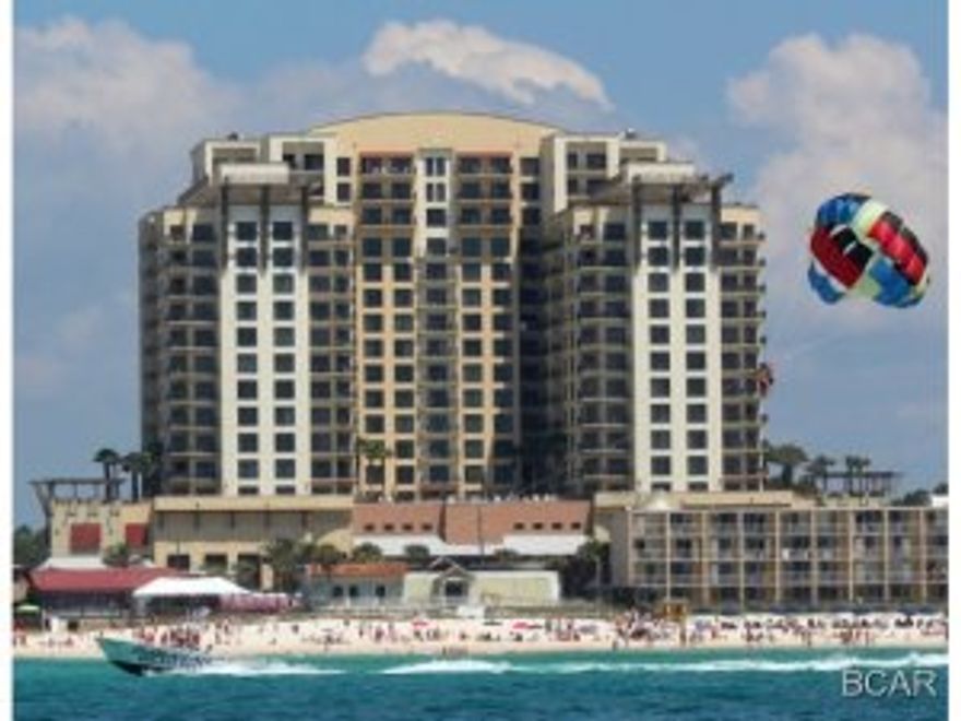 Gulfview! The largest and most popular one bedroom floor plan in Origin featuring a wide postcard perfect view of the Gulf and pool. Only one bedroom plan with a half bath. Huge Master bedroom, 1 1/2 baths, a walk-in closet and additional double closet make this an extremely comfortable layout. Three double windows and the balcony overlook the pool and Gulf. Designed to operate like a four star hotel...Origin at Seahaven has a spacious lobby and interior corridors featuring beautiful African Mahogany entry doors and custom sconces. Perfect location right down the street from Pier Park and Gulf World, and across from Sharky's Restaurant. ALL INFORMATION CONTAINED HEREIN IS DEEMED RELIABLE, BUT NOT GUARANTEED. SUBJECT TO ERRORS, OMISSIONS, PRIOR SALE, CHANGES OR WITHDRAWALS WITHOUT NOTICE.