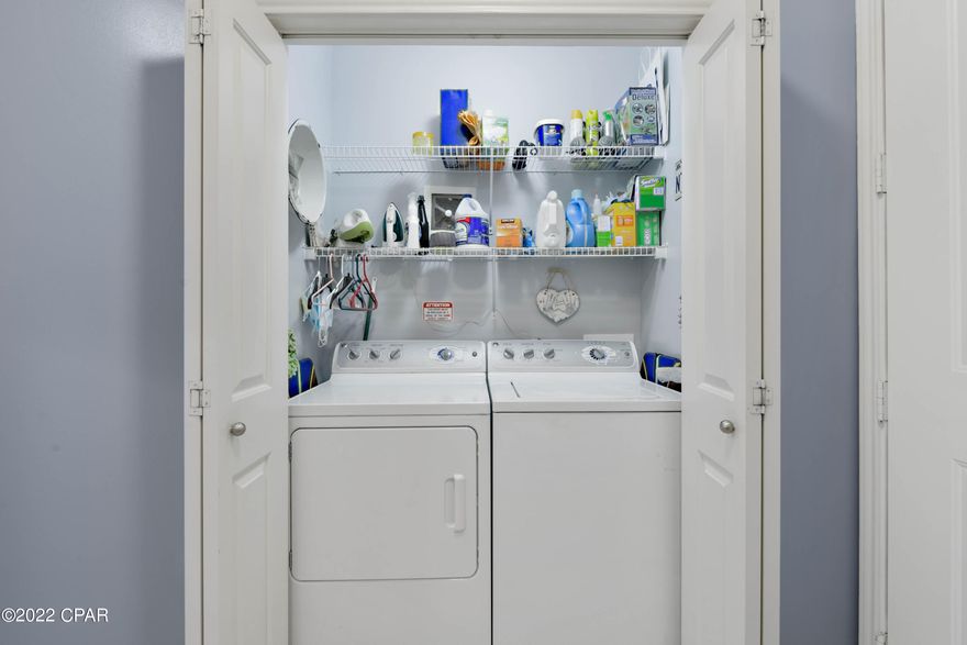 CURRENTLY UNDER CONTRACT, SELLER ACCEPTING BACKUP OFFERS.  This is a beauty! Gated community with NO short term rentals and amenities galore!  This immaculately kept condo offers two master suites each with private access to the balcony.  The condo features new island breeze colors, lovely new plantation shutters, new AC system,new carpet in bedrooms and a great view of the well manicured courtyard with colorful fountains.  Under cover parking.  Relax by the acre island pool with waterfalls or in the hot tub.  Nice fitness room, community/game room, theater, pickle ball or basketball.  Holiday activities throughout the year!  ELEVATORS IN ALL BUILDINGS.