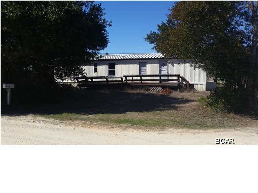 Great price for a home on the West End of Panama City Beach! With a little work, this home could make a great second home or rental. Just blocks to the beach!