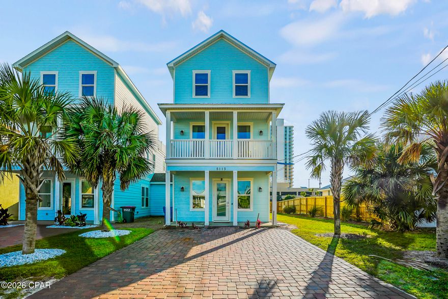 Located in the desirable Treasure Island area of Panama City Beach, this newer 3BR/3.5BA coastal home offers spacious living just one block from the Gulf. Built in 2020, the property features an open layout with 10' ceilings on the main level, 9' ceilings upstairs, and a vaulted third-floor loft leading to an oversized balcony with Gulf views. The kitchen includes soft-close cabinetry, granite counters, a large island, and stainless-steel KitchenAid appliances. Each bedroom has its own bath, including a beautifully finished master suite with a double walk-in shower. Additional highlights include LVP flooring, crown molding, spray-foam insulation, paver driveway, and low-maintenance Hardie exterior. With over 2,500 sq ft of interior space and multiple outdoor living areas, this home is ideal as a primary residence, second home, or investment property on the east end of the beach.