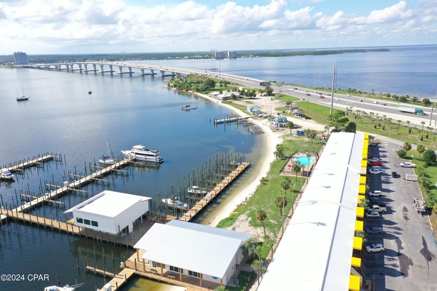 The new owners have rebuilt Sun Harbor Marina on St. Andrew Bay. Located on the east end of the Hathway Bridge adjacent to the Port of Panama City. The two-story restaurant space is now available for lease. The framing is completed and the landlord plans to deliver a 'vanilla-shell' space per the attached plans. The monthly rent is $5,000 NNN, plus operating expenses, and 7% of annual gross sales in excess of $857,413. The tenant improvements are negotiable and the landlord will finish-to-suit. The space is designed to have the main dining room and kitchen on the second floor with additional seating on the wrap around outdoor decks. The first floor includes additional bars, seating, entertainment, bathrooms and storage areas. The second floor is accessed via an ADA ramp. The most incredible views all year. Easy access and plenty of parking. A roof-mounted sign would be visible from the Hathaway Bridge and St. Andrew Bay. 
Sun Harbor Marina is home to the Schooner Columbia and the boat slips are now leasing. The fuel dock is also open. This location will have tremendous visibility and a lot of traffic by boaters, too. Call for further details and to setup a tour.
