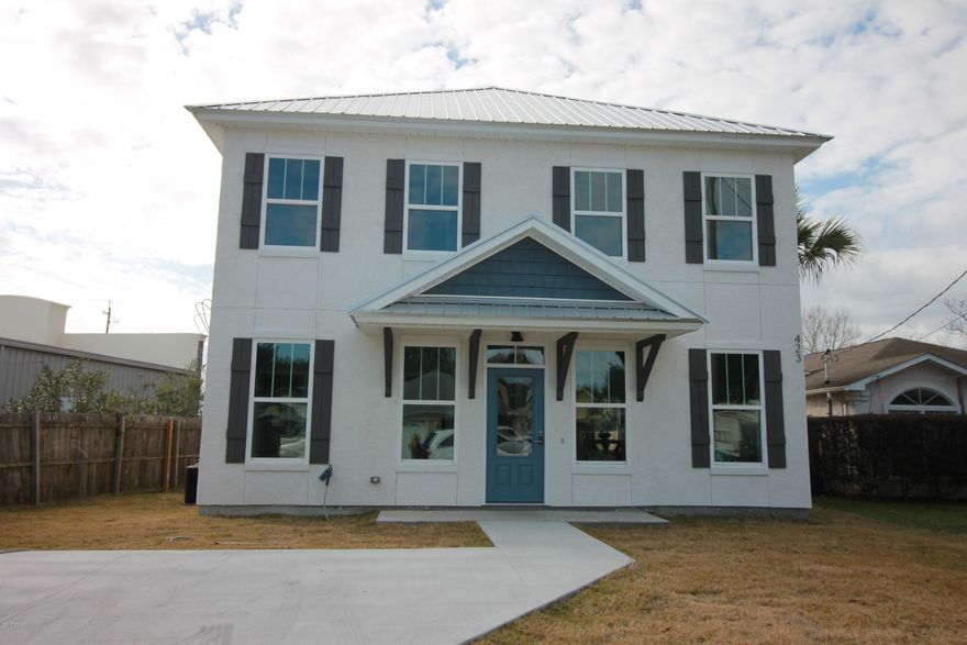 Stunning Rosemary Beach Style homes right here on Panama City Beach, This Home offers Custom Cabinets, Granite Counter tops in the Kitchen. Homes are constructed with Stucco siding. Don't miss this New Construction home today!