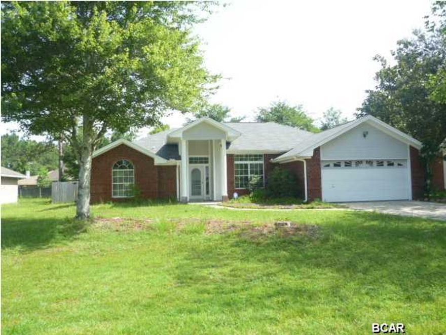 SPACIOUS HOME WITH LOTS OF LIVING SPACE in popular neighborhood and great school district! This 3/2 split floor plan has a formal dining room and a formal living room. The FDR has beautiful hardwood floors, chair rail and crown molding. The FLR has French doors leading to the Fl room...great flow for entertaining! The huge eat-in kit has tons of cabinets and counterspace for food prep. The kit has a very large pantry, plus a smaller one! There is a big breakfast bar and the kit is open to the family room that has a lovely fireplace and features a vaulted ceiling. From the den, you can open the French doors to the Fl room, esp if you are entertaining. The Fl room is spacious, air-conditioned, glassed in, with gorgeous low-maintenance tile floors and ceiling fan. The back pavered patio will be great for grilling and entertaining. The backyard has lots of room for a garden, pool or a game of touch football. The MBA is very roomy and has a dbl vanity, sep shower, walk-in closet and a whirlpool tub. Spacious laundry room has built-in cabinet for storage. Home is located on a cul-de-sac, safe for children and keeps traffic to a minimum. All sizes, age, are estimates. Please measure if concerned.