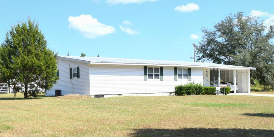 Peacefully tucked amongst 24+/- wooded acres sits this 3-bedroom, 2 bath spacious home. Inside you will find a massive 15x17 living room, eat-in kitchen with an additional dining area, oversized master suite, an abundance of storage space and a 13x19 Florida room. Outside features include a concrete driveway, 2 car attached carport, 12x24 barn and an additional storage shed. Property is located off a paved road between Chipley and Graceville.