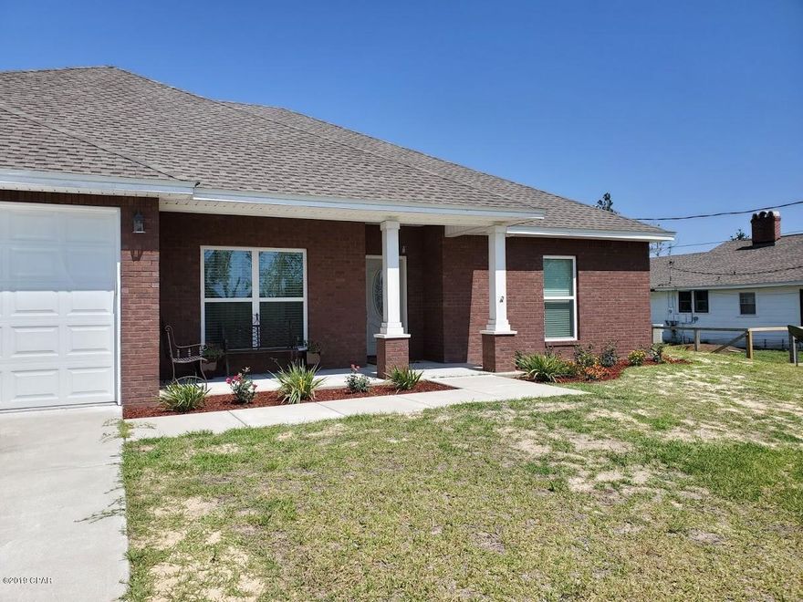 This beautiful custom home is ready for a new owner.  It came through the hurricane with barely a scratch, but it did get a new roof out of the deal!  This home features great energy efficiency with spray foam insulation in the attic and additional insulation in the walls.  The gorgeous and functional kitchen features loads of cabinets, a prep island and two pantries!  The master bedroom suite is spacious with a large walk in closet, en suite bath with double vanities, linen, and oversized walk in shower.  Two more bedrooms in this split bedroom plan, with one currently used as a second master bedroom with direct bath access. The home was framed for an additional door with hall entry.  The backyard features a 24x36 enclosed pole barn with commercial rated 16ft rollup door.