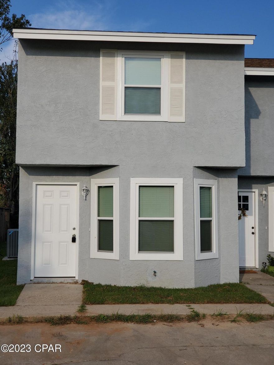 CURRENTLY UNDER CONTRACT, SELLER WILL CONSIDER BACKUP OFFERS || Beautifully remodeled 2 bed, 1.5 bath townhome in the desirable Lynn Haven community! This home has a 2019 roof, 2020 HVAC, 2020 HWH, 2020 windows, LVP flooring in the main living area, an updated kitchen, updated bathrooms, and more. The main floor features an open living room, dining area, and kitchen floor plan that is great for hosting family and friends. There is also a half bathroom downstairs for the ultimate convenience. The kitchen features 2020 appliances, white shaker cabinets, granite counters, and a utility closet with a washer/dryer hook-up. There is also access to the backyard. Both bedrooms are located upstairs and share a full bathroom with a shower/tub combo and updated vanity. The primary bedroom has private access to the bathroom. The bedrooms have carpet and large bathroom. The bedrooms have carpet and large closets. This home would make a fantastic primary residence or rental investment. Located near schools, restaurants, shopping, parks including waterfront parks with boat ramps, and more! Lynn Haven hosts many family friendly events throughout the year. Check out this home today!