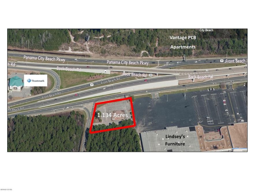 +/-1.134 Acre commercial site near the Hathaway Bridge.  Located at the southeast corner of Front Beach Road (a/k/a U.S. Highway 98) and Holley Lane and west of the Beachwalk Shopping Center.  The corner location has an active Development Order for an 8,487 Sq. Ft. Building.  Zoned C-3, General Commercial in unincorporated Bay County, which allows for most commercial uses.  The site plan is attached.    There is a short-term lease in place that expires 1/31/2019.