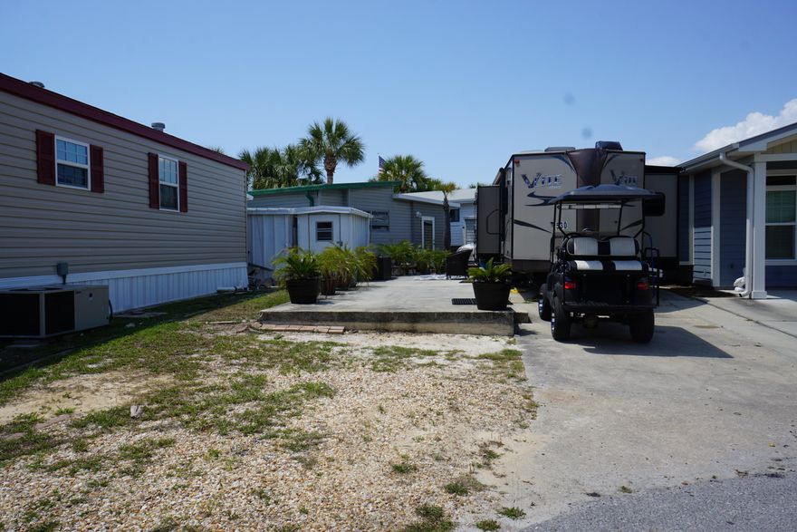 Fantastic opportunity to own in Venture Out! Build your dream home or bring your RV. The RV is not included with the lot. This lot is a in a wonderful location within the resort and is right across from a bathhouse.  Venture Out offers BOTH beach and bay access! The resort also has 2 salt water pools, one heated, tennis, golf, shuffleboard, playground, basketball, fishing pier, boat dock with slips & boat ramp. Venture Out is a golf cart community that has exploded in popularity within the last few years. A gated, pet friendly community that's great for full time residency or just to vacation. 24 hour security & friendly atmosphere. It's all here in Venture Out!