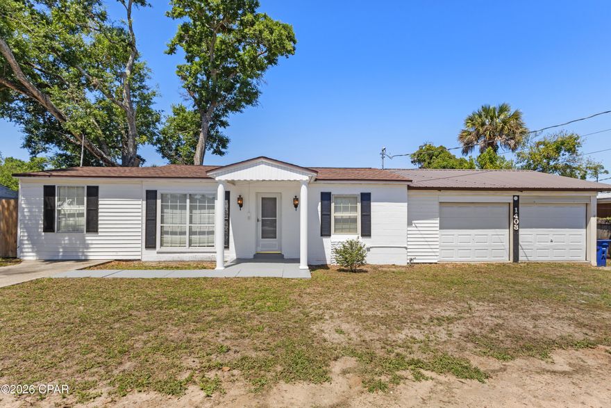 This updated Florida cottage puts you right in the middle of everything people love about living in Panama City. With 3 bedrooms, 2 bathrooms, and a layout designed for everyday living as well as entertaining, this home offers the kind of space and functionality that's hard to find at this price point. Natural light fills the interior, highlighting the updated flooring, newer appliances, and the well-maintained condition throughout. Major improvements have already been taken care of, including the HVAC system, roof, and water heater, all which have been replaced within the last few years for added peace of mind.

Outside, the home continues to impress with a screened-in patio, oversized deck, privacy-fenced backyard, and additional outdoor storage. The oversized true two-car garage provides plenty of room for vehicles, tools, beach gear, or hobbies. The street itself has recently been repaved and improved with new curbs and sidewalks adding to the overall appeal of the neighborhood.

Location is one of the standout features here. This home is less than five minutes from Beach Drive and the public beach access at Calhoun Beach Park and just minutes from Historic St. Andrews and Downtown Panama City.  You're also under 20 minutes from the white sandy beaches of the Gulf. Whether you're looking for a full-time residence, a second home near the water, or an investment opportunity with short-term rental potential, this property checks all the boxes for enjoying the Florida lifestyle year-round.