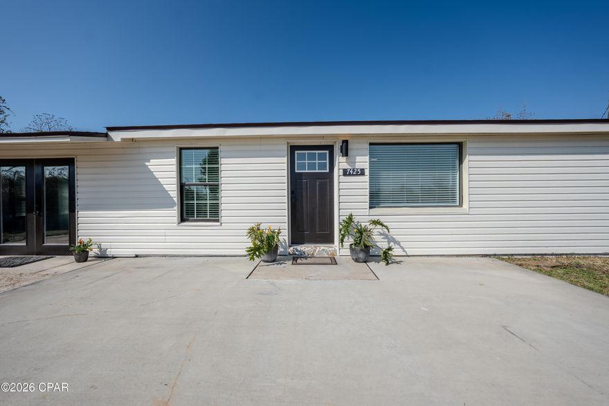 Beautifully updated 2-bedroom, 2.5-bath home offering approximately 1,276 sq ft, located across the street from Deer Point Lake and surrounded by a peaceful setting perfect for enjoying the outdoors and nearby fishing. Both bedrooms are custom en-suites featuring custom cabinetry, built-in closets, and waterfall showers, creating a private and elevated living experience. The home showcases beautiful tile flooring throughout, along with tongue-and-groove ceilings in the living and kitchen areas that add warmth and character. The kitchen offers custom cabinetry, including a dedicated end cabinet pantry unit for added storage and functionality.

Recent improvements include a new roof, new doors, and fresh exterior paint. Inside you'll find flat ceilings, new light fixtures, fresh interior paint throughout, new flooring in the living area and kitchen, updated kitchen cabinets, new door hardware, and a new attic ladder.

A Florida room off the back provides a perfect space for a sitting area or additional den, leading out to a back porch with a custom pergola — ideal for relaxing evenings outdoors. The property is completely fenced for privacy, and to the right of the home is an existing pad where a pole barn once stood, offering a great opportunity to build a workshop or bring back a pole barn. The possibilities here are endless.