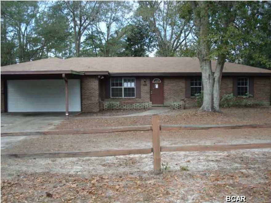 Don't miss your opportunity for a great buy in the desirable Lynn Haven neighborhood, close to North Bay, 5th St Park and great fireworks displays, not to mention this a wonderful home. Home sits on two lots with peaceful surroundings and fenced backyard. A wonderful floor plan including den/family room with fireplace, separate dining and living rooms, 3 spacious bdrms and 2 baths. Double oversized garage for storage with double carport too. (All info is approximate. Any and all info should be verified by the buyer if important.)