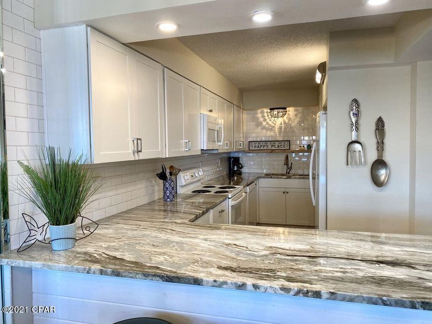 CURRENTLY UNDER CONTRACT, SELLER ACCEPTING BACKUP OFFERS



Fantastic views of the Gulf from the master bedroom, living area and balcony.  If you are looking for a good investment on the Gulf, then you need look no further. This condo has been completely renovated and has already generated $51,000 this year in rental income ! The complex has 24-hour security, two large pools, one of which is heated, kiddie pool, hot tub, and community room with large kitchen, pool table, game room and tennis courts. It is close to fantastic restaurants and shopping areas. In addition, St Andrews Park is less than a mile East of complex where one can put in fishing boats, sail boats and small cruisers. The Park is full of wildlife and wonderful nature walks. A Major sports complex is also just a short  driv