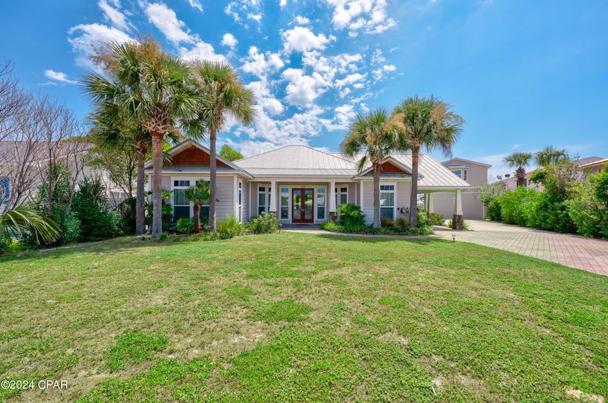 HIGHLY DESIREABLE MULTI ON THE WEST END!  This home is in the absolute perfect vacation and functions as a resort style property.  The main house has an open floor plan with 3 bedrooms and 2 bathrooms.  The second home has an incredible came room with an upper loft featuring 4 beds.  There is also a bathroom and laundry in this area.  The above unit is a two bedroom one bathroom unit complete with a kitchen and living room.  The courtyard and pool area complete with pergola and hot tub put this property over the top.  Tremendous rental history and projections are available.