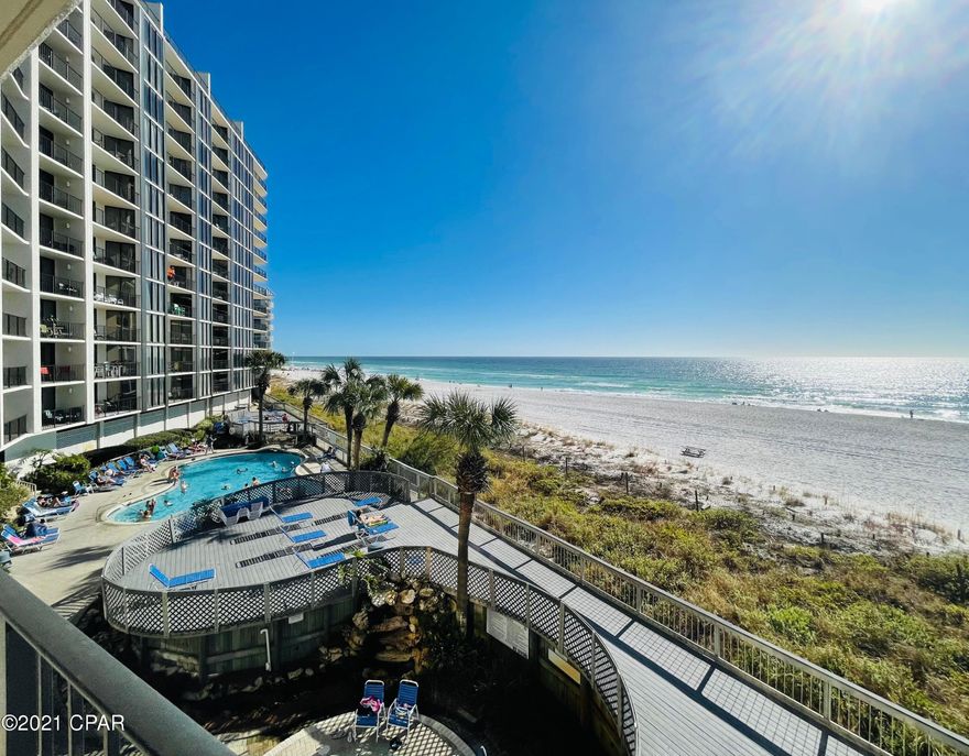 Do not miss out on this beautiful 2-bedroom, 2 bath, lower floor beach front condo located in Edgewater Tower III. Relax and experience gorgeous sunsets, amazing views of the white sandy beaches and emerald green waters of the Gulf of Mexico. This condo features 18 Inch tile floors, and beach front Master suite with king size bed. The master bath features dual vanities, granite counters, a huge walk-in shower, and walk-in closet.  The kitchen is fully equipped with granite counters and beautiful wood cabinets. The quest bedroom has two Queen beds and granite counters in the bath. Edgewater Resort is 110 acres and amenity rich, including a Beach-Front spa and Lagoon Pool, fitness center, a 9-hole par three golf course, and tennis center, BBQ Grills and picnic area, several community pools, hot tubs, food outlets, conference center, and of course those beautiful sandy white beaches. This turnkey rental ready condo is tastefully decorated and being offered fully furnished. Whether you are looking for a beach front resident, second/vacation home or income producing rental property, then look no further. This amazing condo has it all.