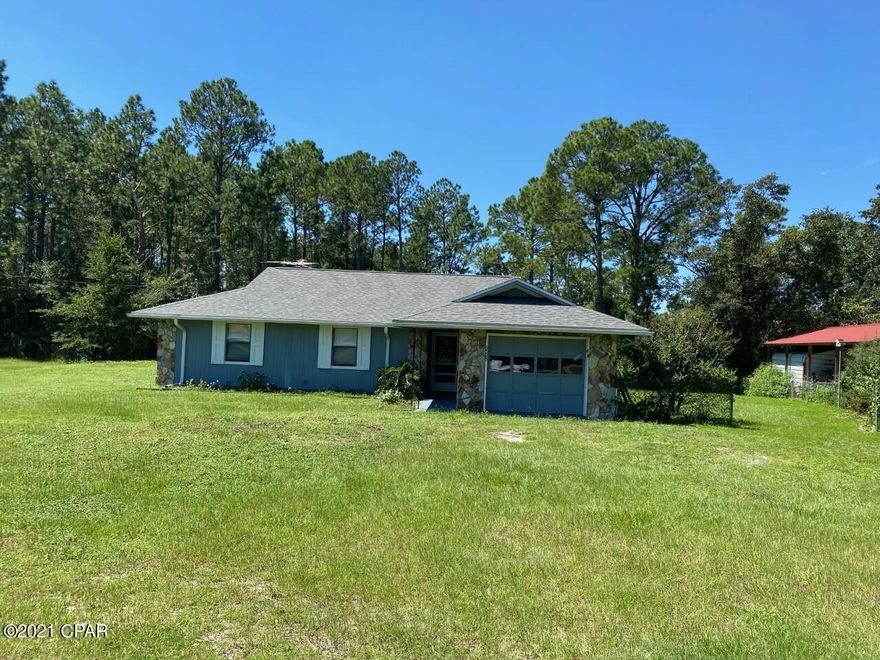 Great find in North Panama City Beach.  Close to the air port, and just a short drive to the beach, this home features a large yard, 3 bedrooms, 2 baths, tile floors and much more.