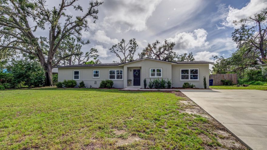 COVE CHARMER WITH MANY RENOVATIONS AND ONGOING UPGRADES.  Situated south of Cherry Street in the Cove on an oversized lot with fenced in back yard this home boasts newer windows, a brand new roof, new hvac system, new paint and many upgrades currently being completed by the seller. The seller is in the process of completing trim, paint and crown molding work, sanding and refinishing the hardwood floors throughout, installing lighting fixtures and outlet covers, installing brand new cabinets and counter tops in the kitchen with new stainless appliances. Expected completion date September 2019. Design renderings in photos.  Property will be like new and will not last long!