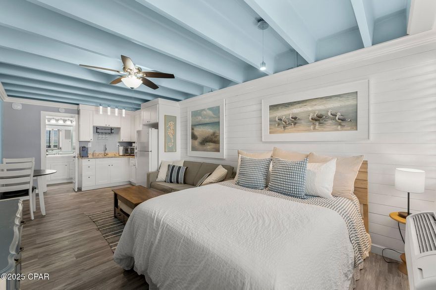 Now is your chance to own one of the most stunning Gulf Front Studios in all of PCB with Owner Financing and no outstanding HOA special assessments due! Sellers have fully paid off all of the existing special assessments. This unit has been meticulously remodeled with amenities that you rarely see in a unit of this size. The bright and airy kitchen features modern lighting along with white shaker cabinetry, granite countertops, a full-size refrigerator, electric cooktop and a separate toaster oven/convection/air fryer.  The bathroom features a built-in white shaker vanity with granite countertop, coastal design mirror, modern lighting, and shiplap walls. The bedroom and dining area walls are all white shiplap and decorated with boat oars, coastal artwork, and a wall mounted flat screen TV. The windows have  custom wood shutters that open to reveal a stunning view of the Gulf of Mexico.  All flooring in the unit has been updated as well with natural wood-look LVP. This vacation condo is self-managed, has a strong rental history, and future bookings may be conveyed. 
Contact us today for your private showing of this incredible investment gem that is located only one mile from Pier Park, the newly opened Dolly Parton Pirate Dinner Theater, and the upcoming Topgolf. 
Note: Monthly HOA fee of $895 includes​​‌​​​​‌​‌​​​​‌​​‌​​​​‌‌ electricity!