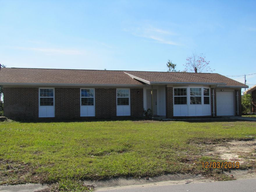 Completely redone 4 bedroom 2 bath home ready for a new family.  Improvements include, new roof, floors throughout, all interior doors and hardware, entire new kitchen and bathrooms, windows, AC units inside and out, and a new water heater.  Don't hesitate to call and see this property soon as it won't last long.  There is some yard work that still needs to be completed in the back, but is reflective in the asking price.