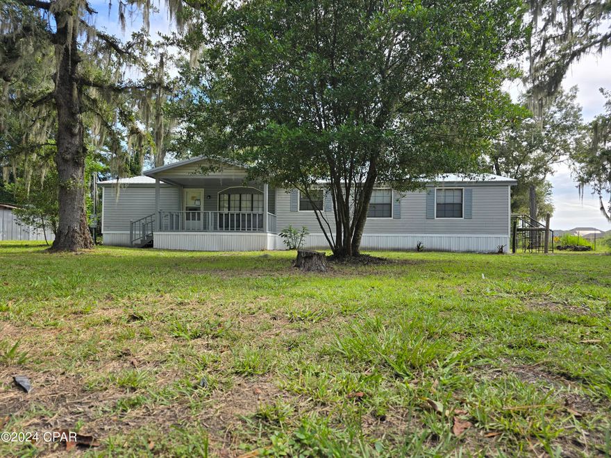 Remodeled 3 Bedroom 3 Bath Home resting on just under 1 Acre! This home, located in the quickly growing Crawfordville area, features everything from a new roof, to new carpet, paint, and appliances. Outside the home boasts a large covered front porch, large oak trees, and an additional detached building for equipment storage, or a workshop. Schedule your showing today!