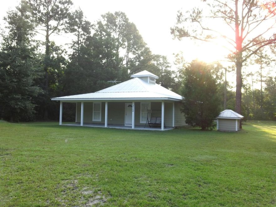 3 BR 2 BA Home with extended porches. Almost an acre, very private but close to town! All property sizes and ages are approximate, please measure and/or verify if important. School assignments are subject to change, please check with Bay County for most accurate information. Pets NOT allowed.