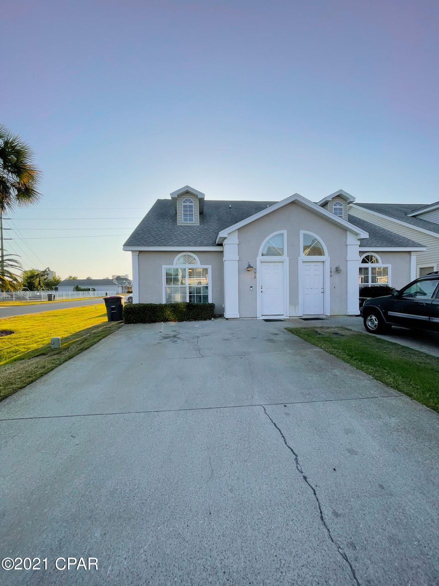 CURRENTLY UNDER CONTRACT - SELLER ACCEPTING BACK-UP OFFERS-Beautiful townhome in a great location. Gated community!  Sold furnished. Palm Cove allows short term rentals - perfect for investors! Large 3 bedroom, 2.5 bath home. On a corner lot and has a fenced back yard, one of a few homes that do. The fenced yard is great for privacy and relaxing and watching the sunset. Spacious open concept on the main floor. The 2 upstairs bedrooms have a jack and jill access to the shared bathroom. New LVP flooring in the master. Cabinets were recently updated in the kitchen. Drop in stove in the island is great for entertaining while cooking. AC unit was replaced in 2017. The HOA covers all grounds maintenance, 2 pools to enjoy at the front of the neighborhood.