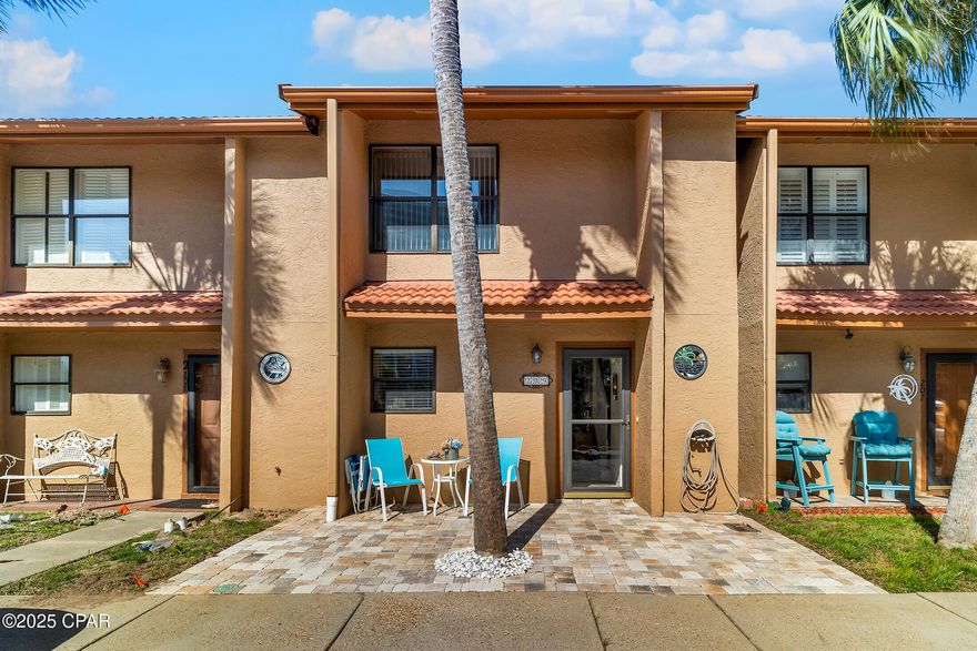 JUST A FEW SHORT STEPS to the warm white sands and cool blue waters of Panama City Beach! BRAND NEW ROSER STONE-COATED STEEL ROOF installed November 2025!  A/C and Water Heater 2018. One year home warranty on all appliances, HVAC, and Water Heater! This lovely Gulf Highlands Beach Resort townhome is fully furnished and ready  for your family! Park directly in front of your unit in the two dedicated parking spots. No elevators to maneuver with groceries or beach toys! The large, open floor plan, full-sized kitchen with an oversized breakfast bar, stainless steel appliances, and abundant cabinet and counter space makes this the ideal place for friends and families to gather. The living area features sliding glass doors which lead to a lovely patio area and the largest swimming pool in the resort. This townhome has a canal view in the front and a pool view in the back with no other units directly behind or in front. Gulf Highlands offers an array of amenities including 11 swimming pools (5 heated), 3 tennis courts, pickle ball, fitness center, 18 hole mini-golf, 2 playgrounds, shuffleboard, conference center, and a private clubhouse featuring restaurant and pool overlooking the Gulf. Numerous entertainment options are available within walking or golf cart distance, including Rock'it Lanes Bowling/Skating/Arcade, Just Jump Trampoline Park, Shipwreck Island Water Park, Ripley's Believe it or Not, Wonder Works, fishing pier, shops, restaurants, bars, and more. This secure, golf cart-friendly resort offers an ideal environment for short-term renters and full-time residents alike. This unit is not on a rental program at this time, but it has a projected annual rental income of over 40K.  The low HOA fees cover all amenities, including trash, internet, landscaping, pool servicing, and termite & pest control. At Gulf Highlands Beach Resort, every season is Beach Season!  Age, Sq Ft, and dimensions approximate.