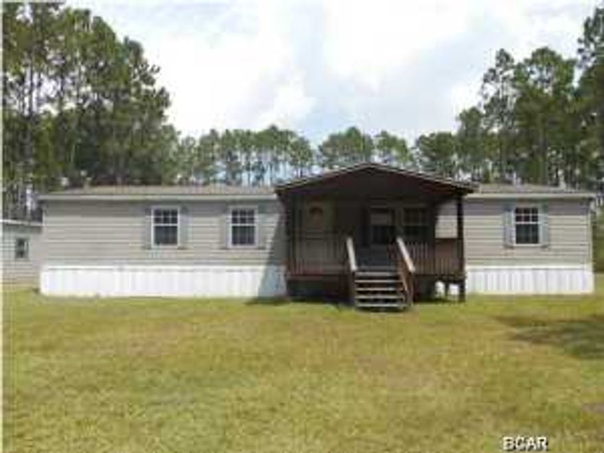 Here's your opportunity to own a lovely, large home, with a great big kitchen, complete with center island, perfect for the person who loves to cook. This home is located in Sandy Creek, just 15 minutes from Tyndall AFB and Panama City, with very few neighbors and tons of privacy. The master bedroom suite is complete with a 5 piece ensuite, including garding tub and separate shower. This home has 3 bedrooms, PLUS an additional study/sitting room or office. (Buyer to verify ANY info that is important, as all information provided is approximate and not guaranteed to be accurate.)