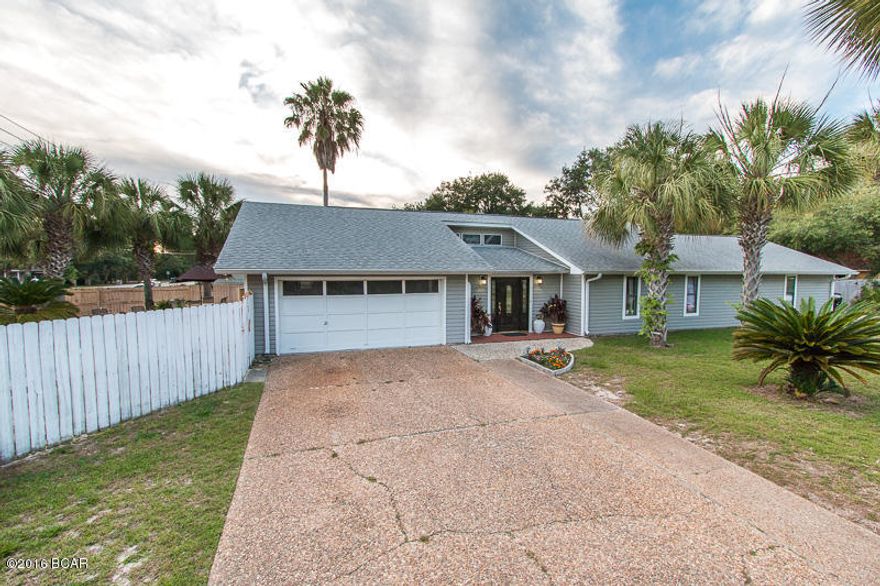 So many possibilities here!! Located on a corner lot, with a pool, and across the street from grand lagoon; this amazing property won’t last long. This awesome property can be a 3 bedroom/2 bath home with a 1 bedroom/1 bath/kitchen mother-in-law suite… or a 4 bedroom/3 bath home with an oversize bonus room and kitchen area perfect for a game room or office. The roof, exterior siding, and AC were replaced in 2009, along with the kitchen and bathrooms being remodeled. This home is absolutely amazing and priced very well for all it has to offer. Call us today!